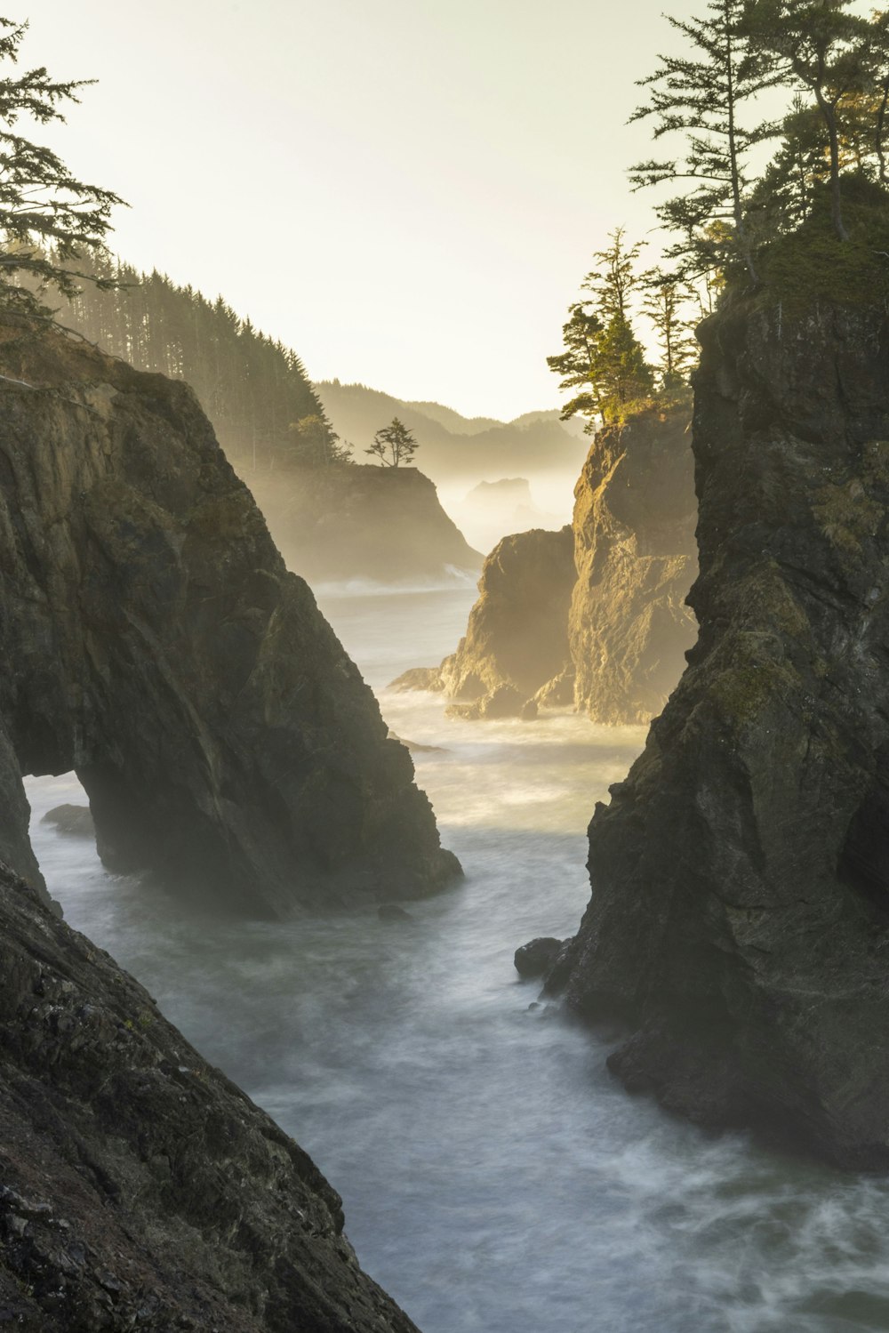 a large body of water surrounded by rocks