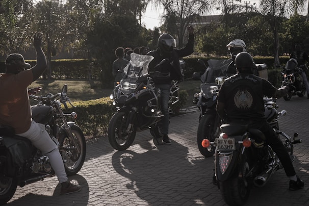 A group of Turnpike Ramblers MC members lined up with their motorcycles on a sunny day near Wertzville Road.