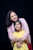 a woman holding a little girl in her arms