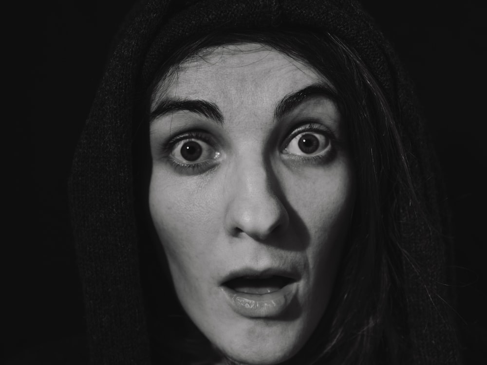 a woman with a surprised look on her face