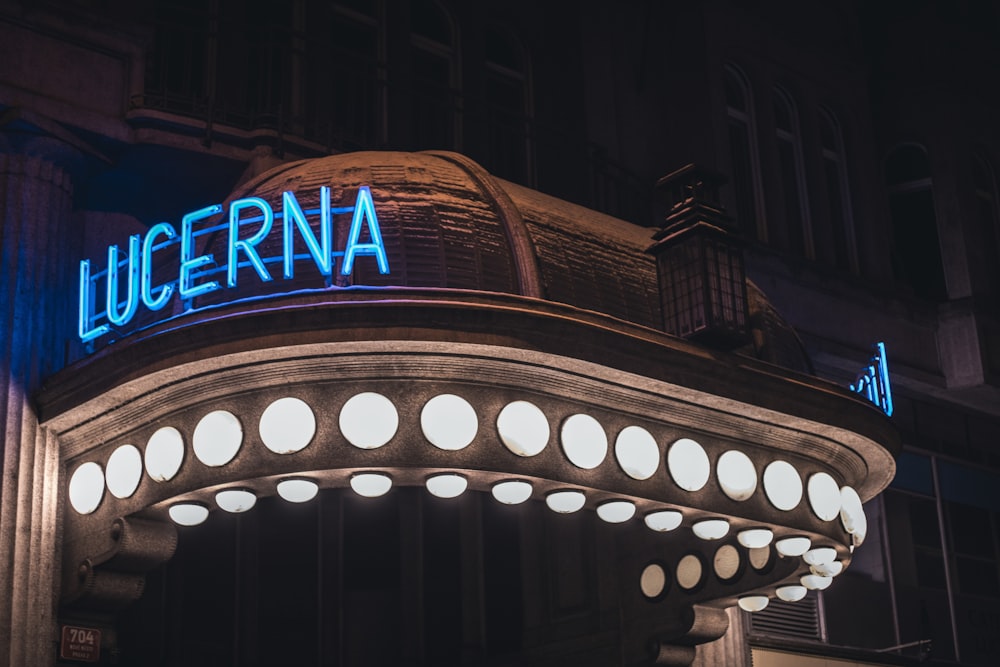 a building with a lit up sign that says lugerna