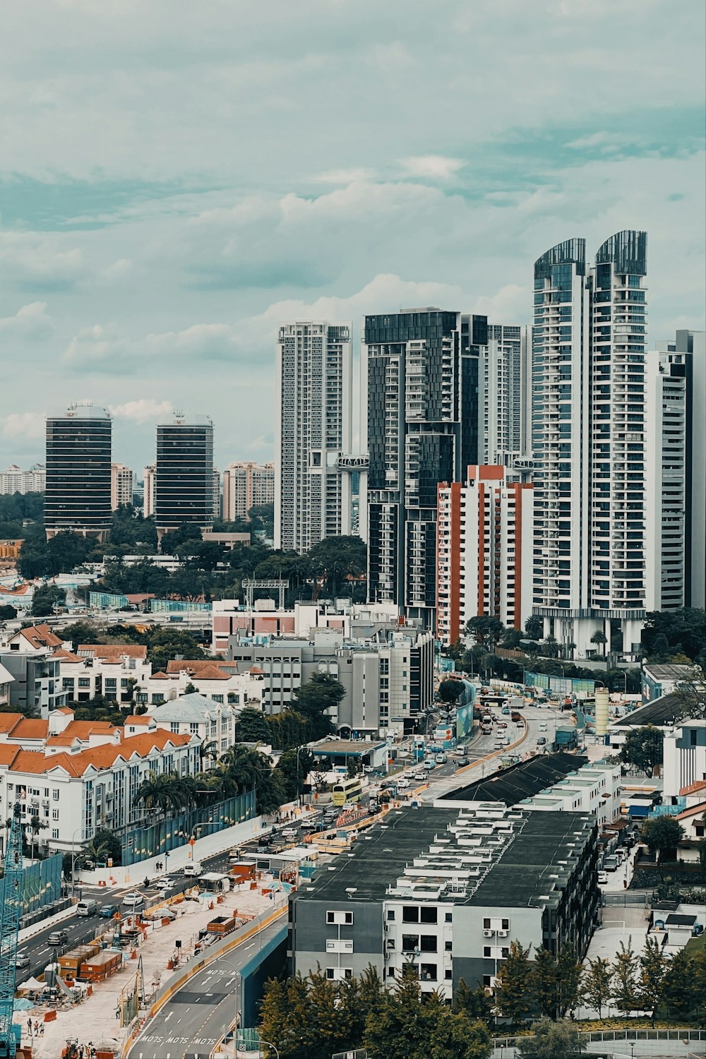 a view of a city with tall buildings