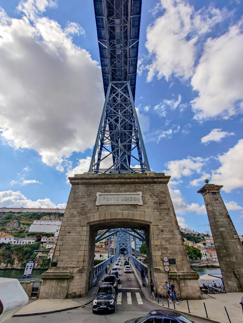 a very tall bridge spanning over a river