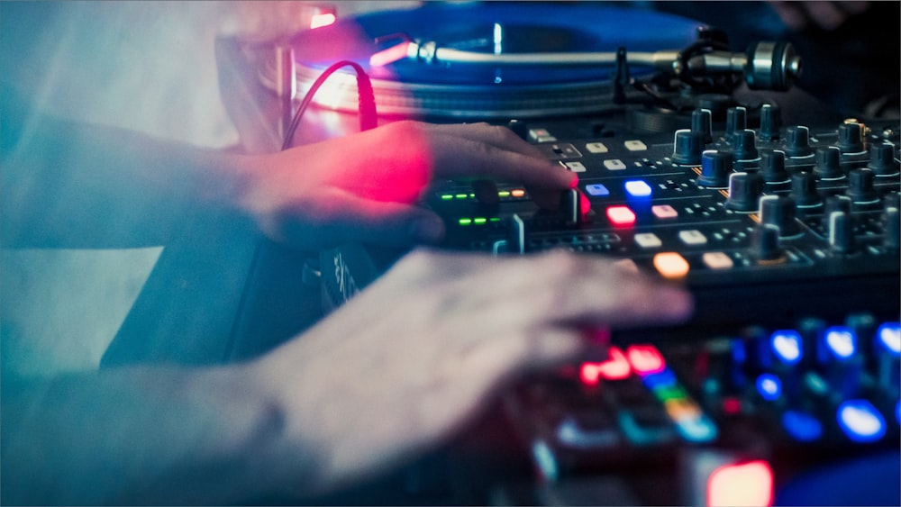 a dj mixing a track with his hands