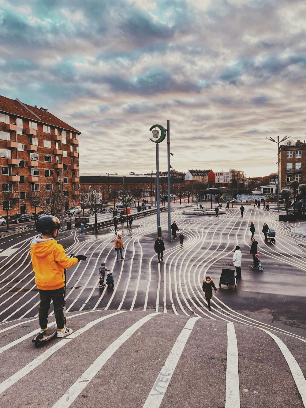 a group of people riding skateboards down a street