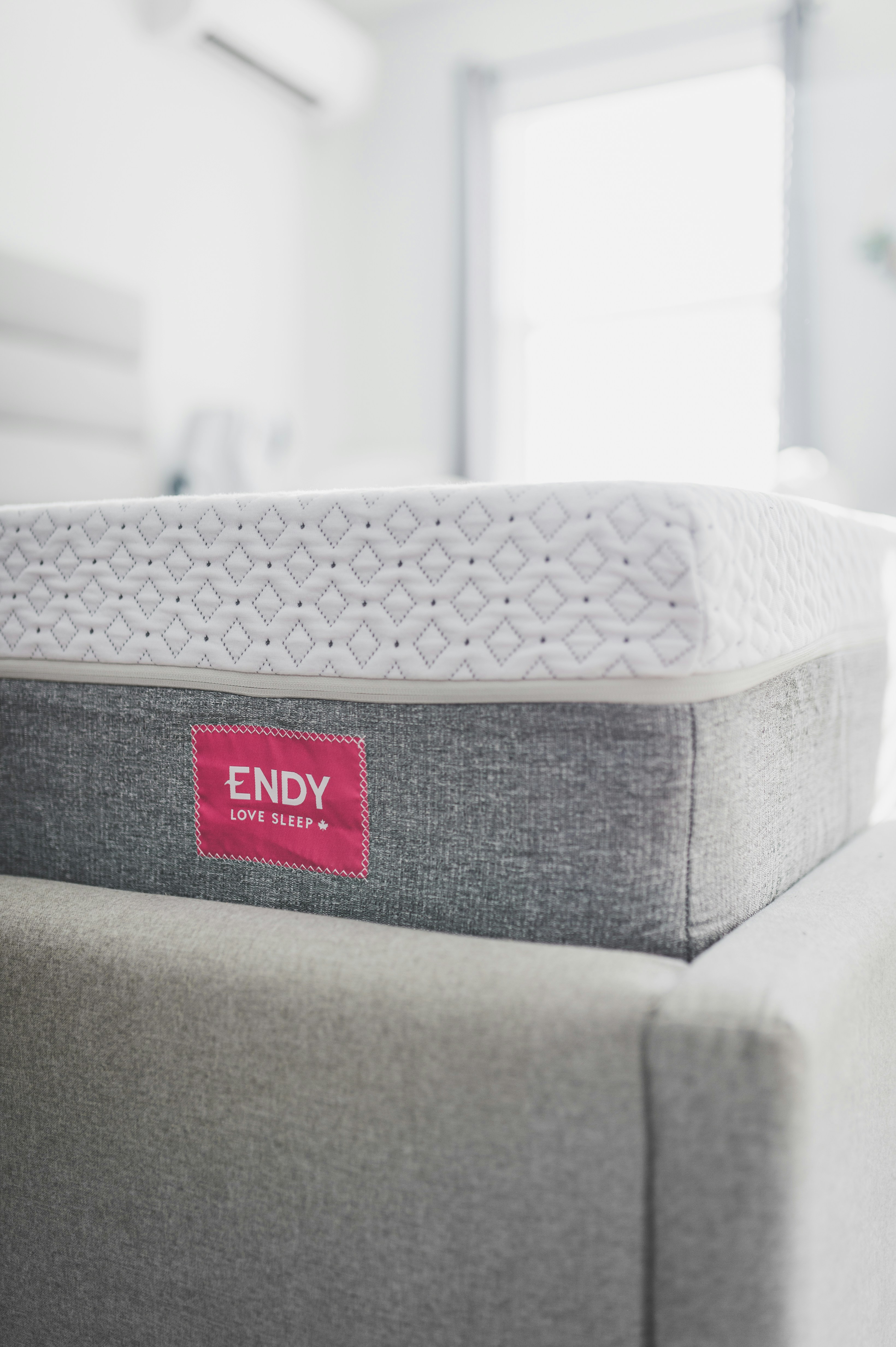 a close up of a mattress on a couch