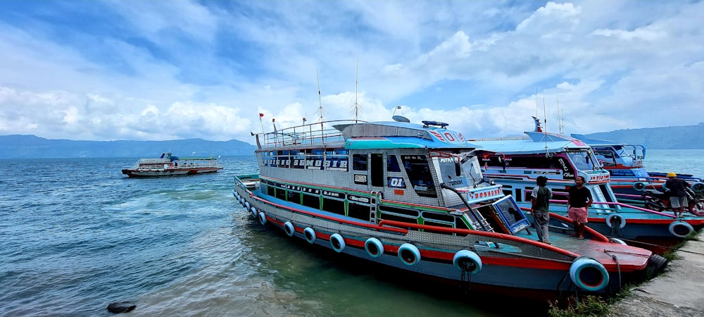 a group of boats that are sitting in the water