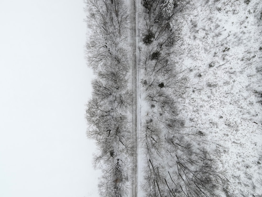 an aerial view of a snow covered road