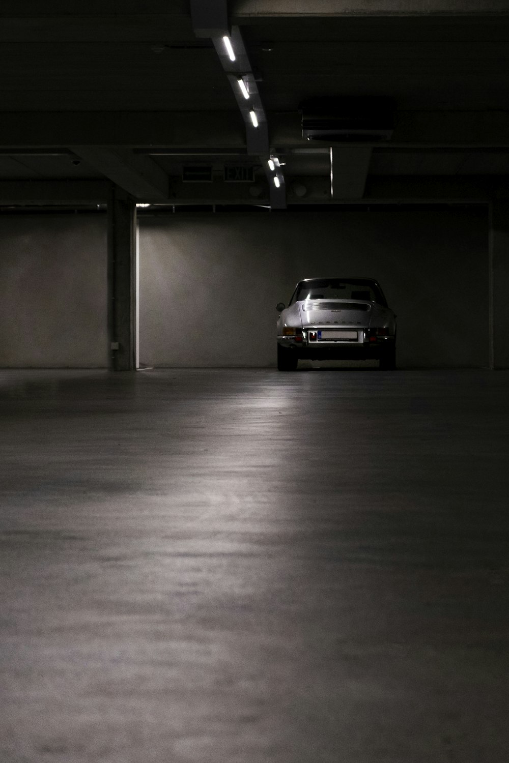 a car is parked in a parking garage