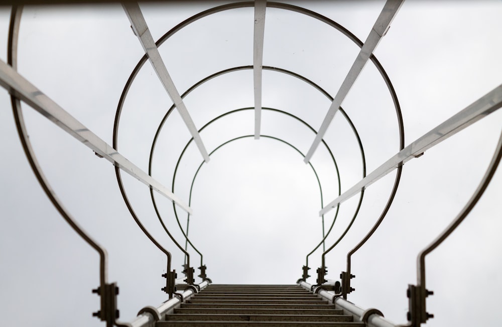 a set of stairs with a sky in the background