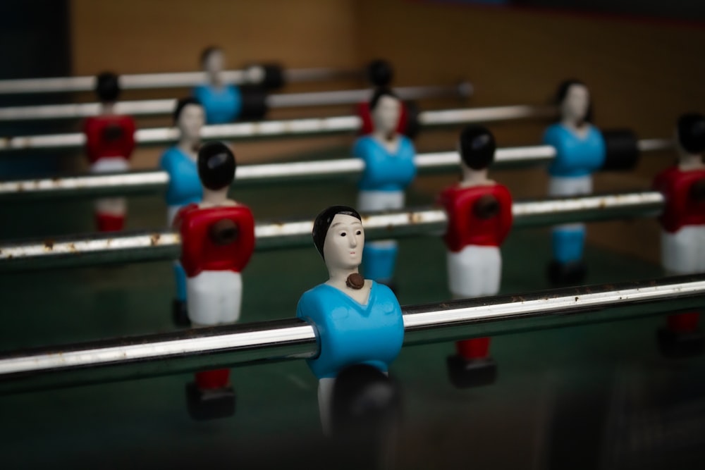 a group of small figurines sitting on top of a table