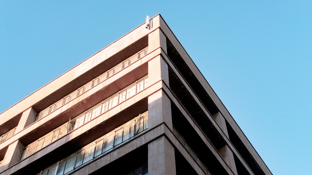 a tall building with a clock on the top of it