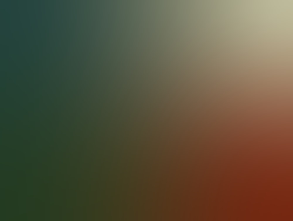 a blurry image of a red and green background