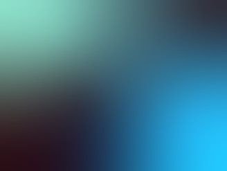a blurry image of a blue and green background