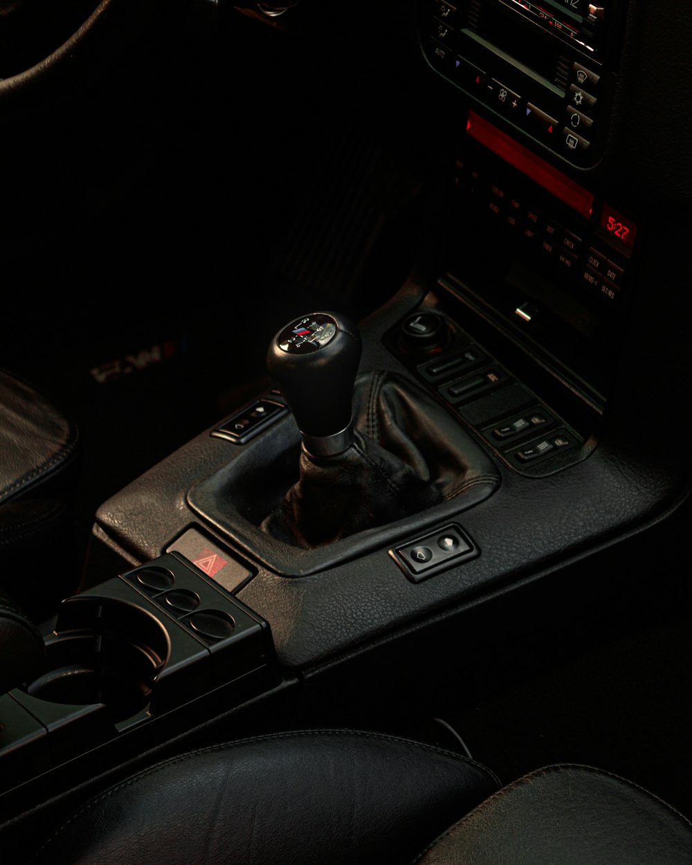 a close up of a car dashboard with a steering wheel