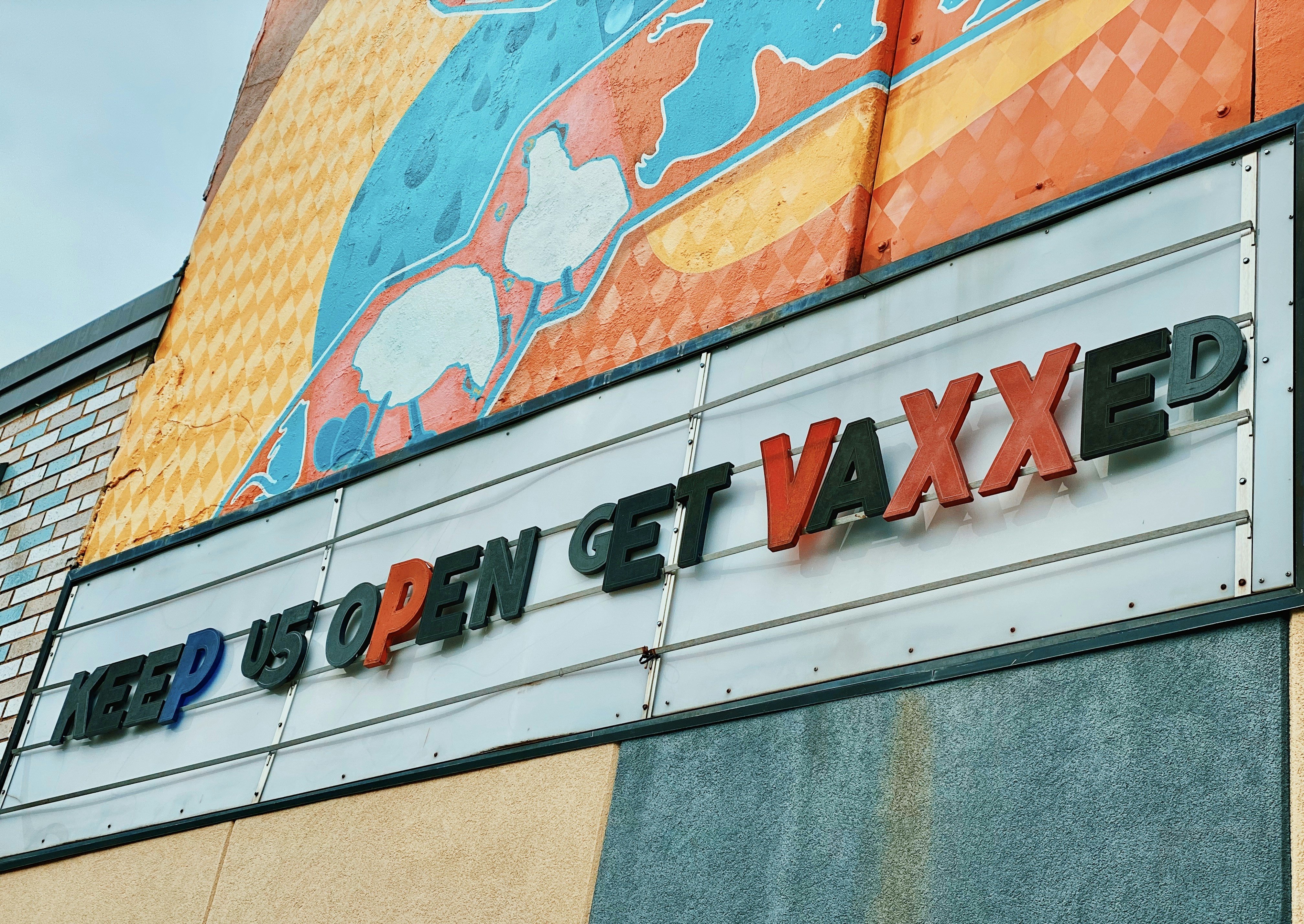 a large sign on the side of a building