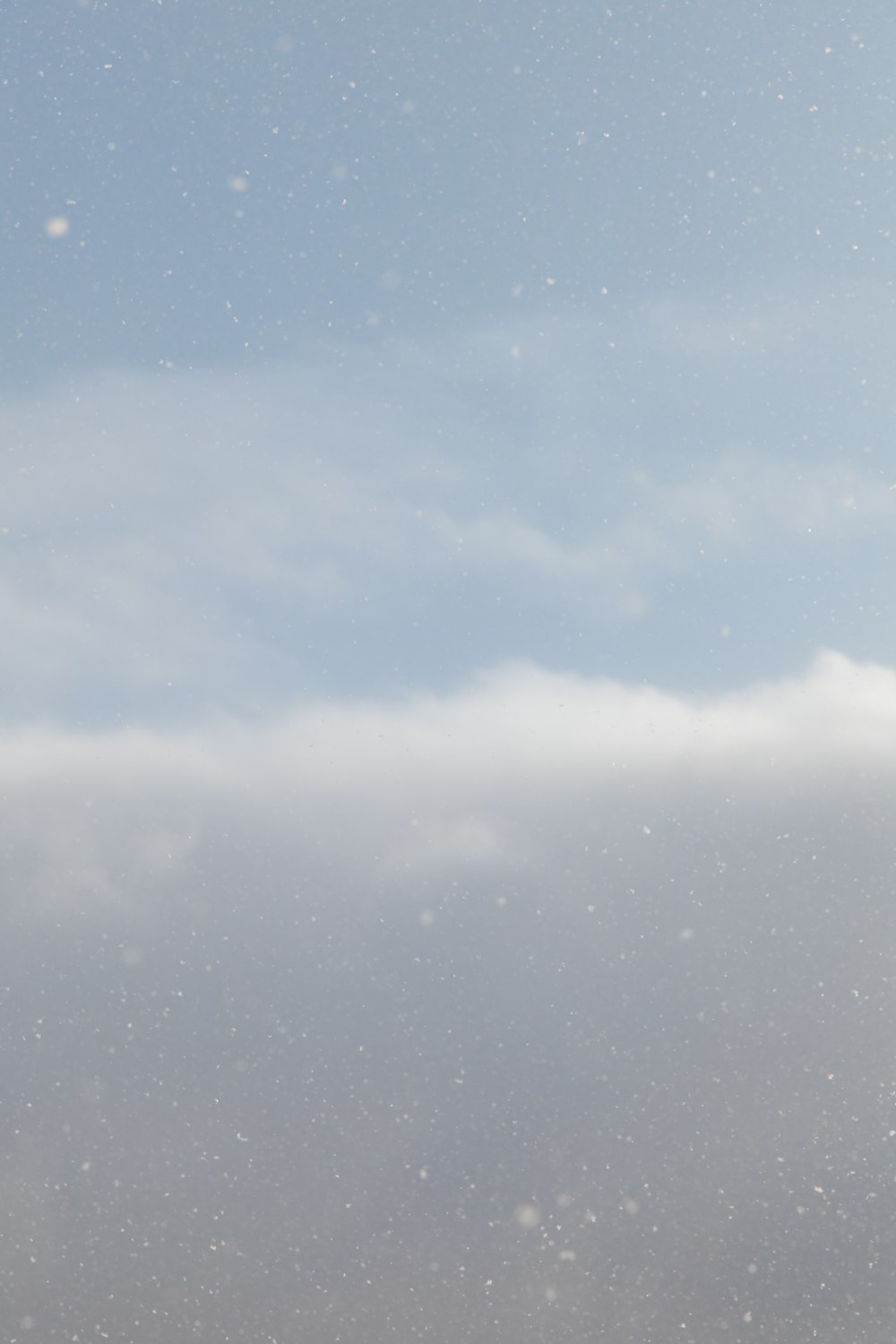 a person on a snowboard in the snow