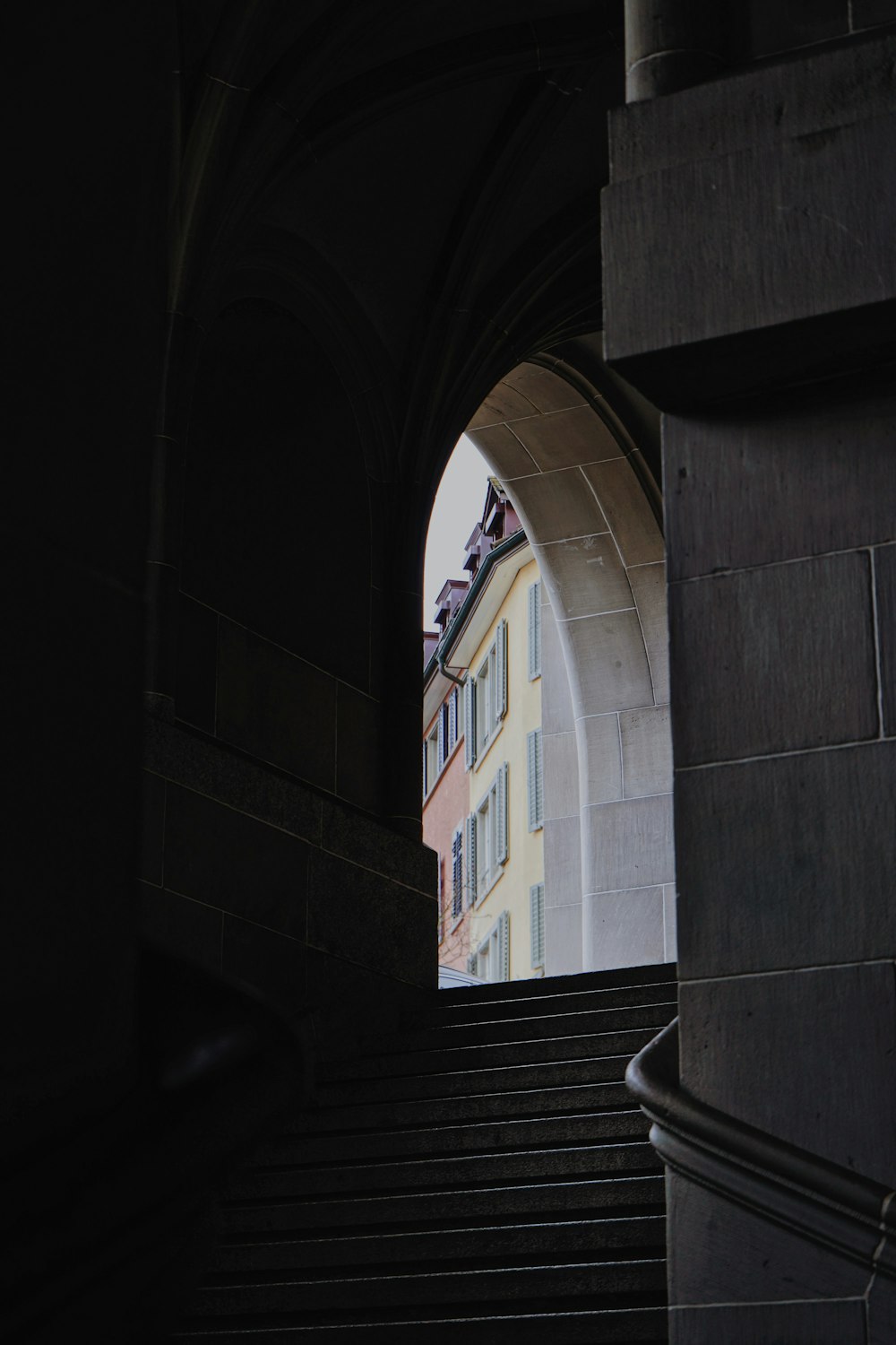 a view of a building through an archway