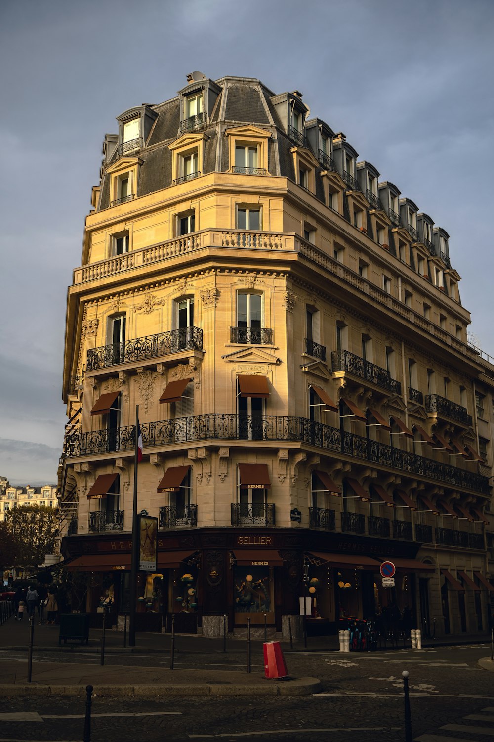 a tall building with balconies and balconies on the top of it