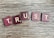 trust spelled with wooden letter blocks on a table
