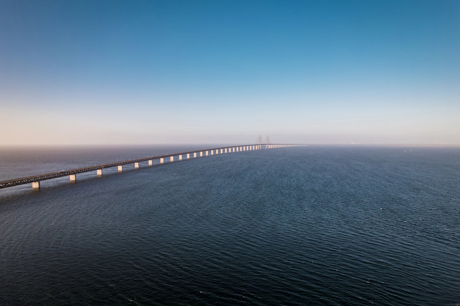 Long Danish bridge crosses open blue water