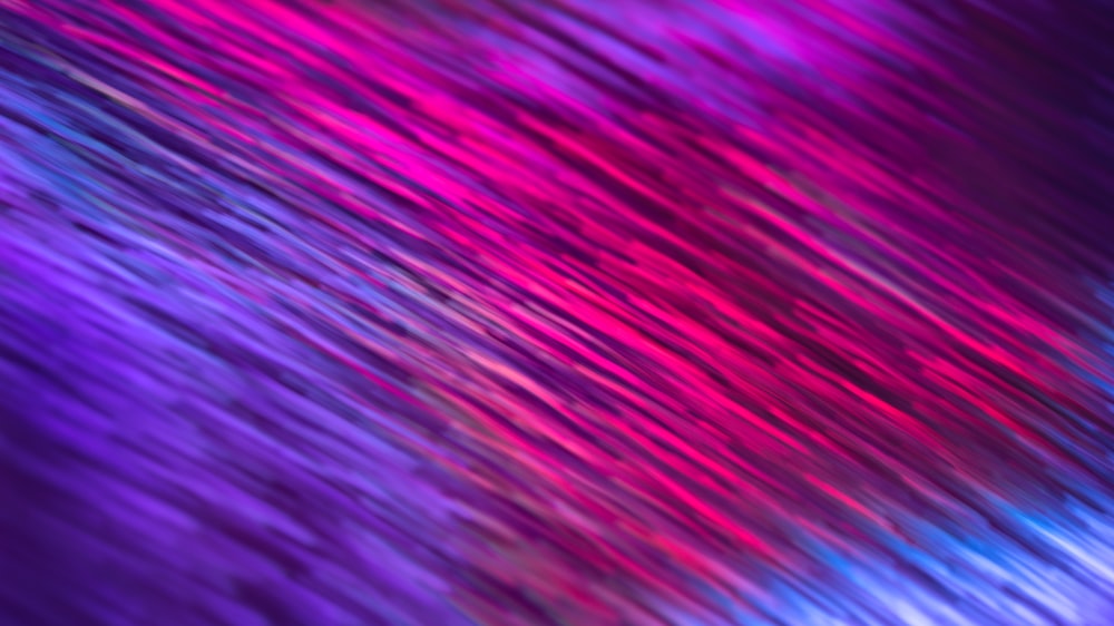 a blurry image of a purple and blue background