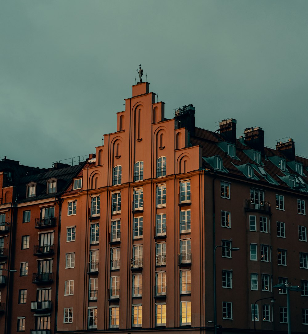 a tall building with a clock on the top of it