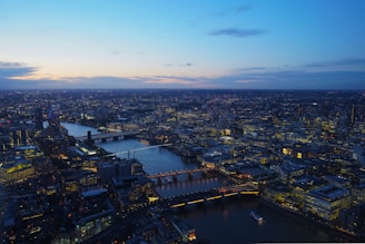 an aerial view of the city of london at night
