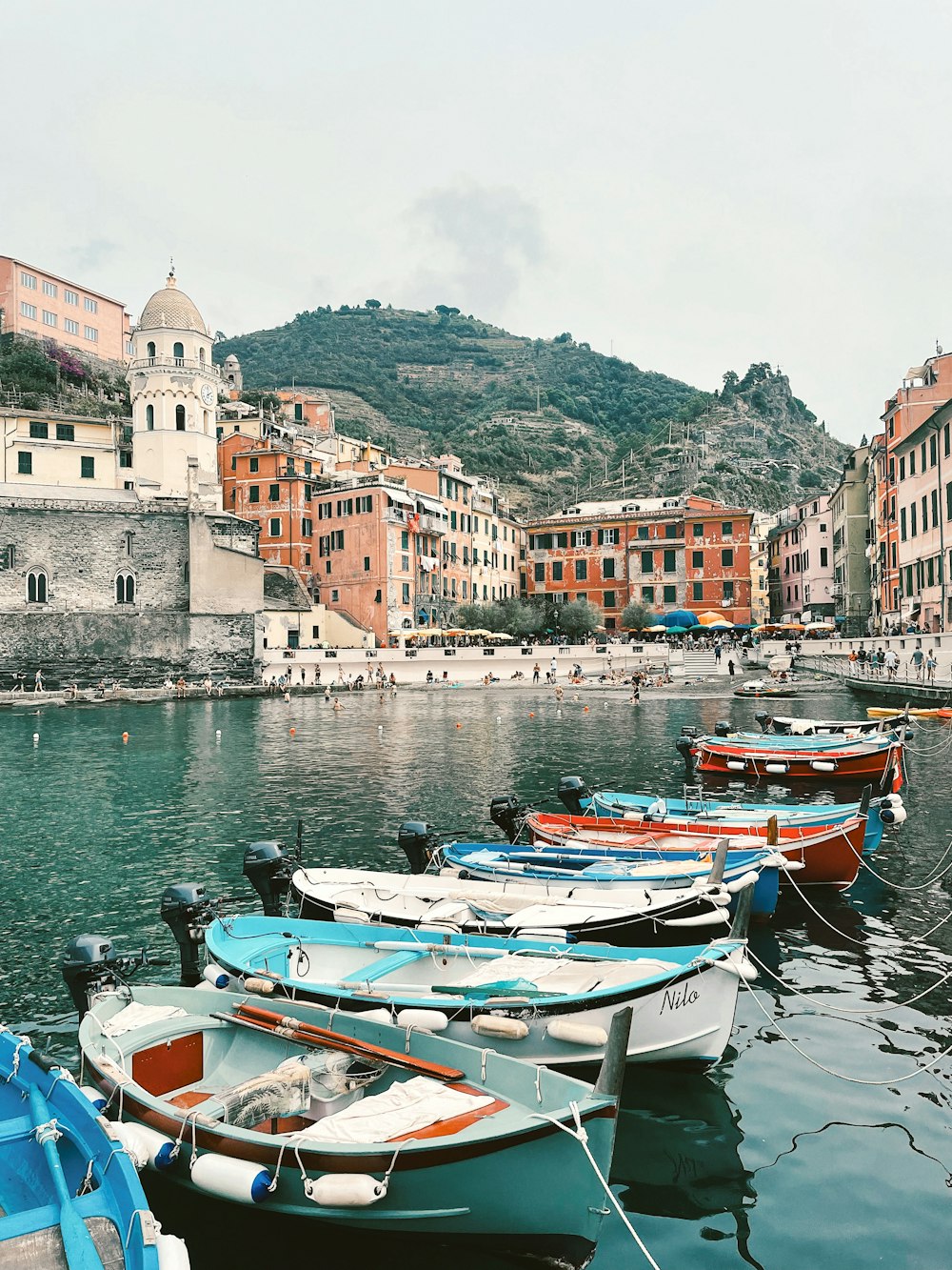 a bunch of boats that are sitting in the water