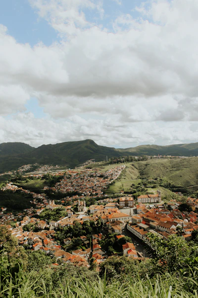 a view of a city from the top of a hill