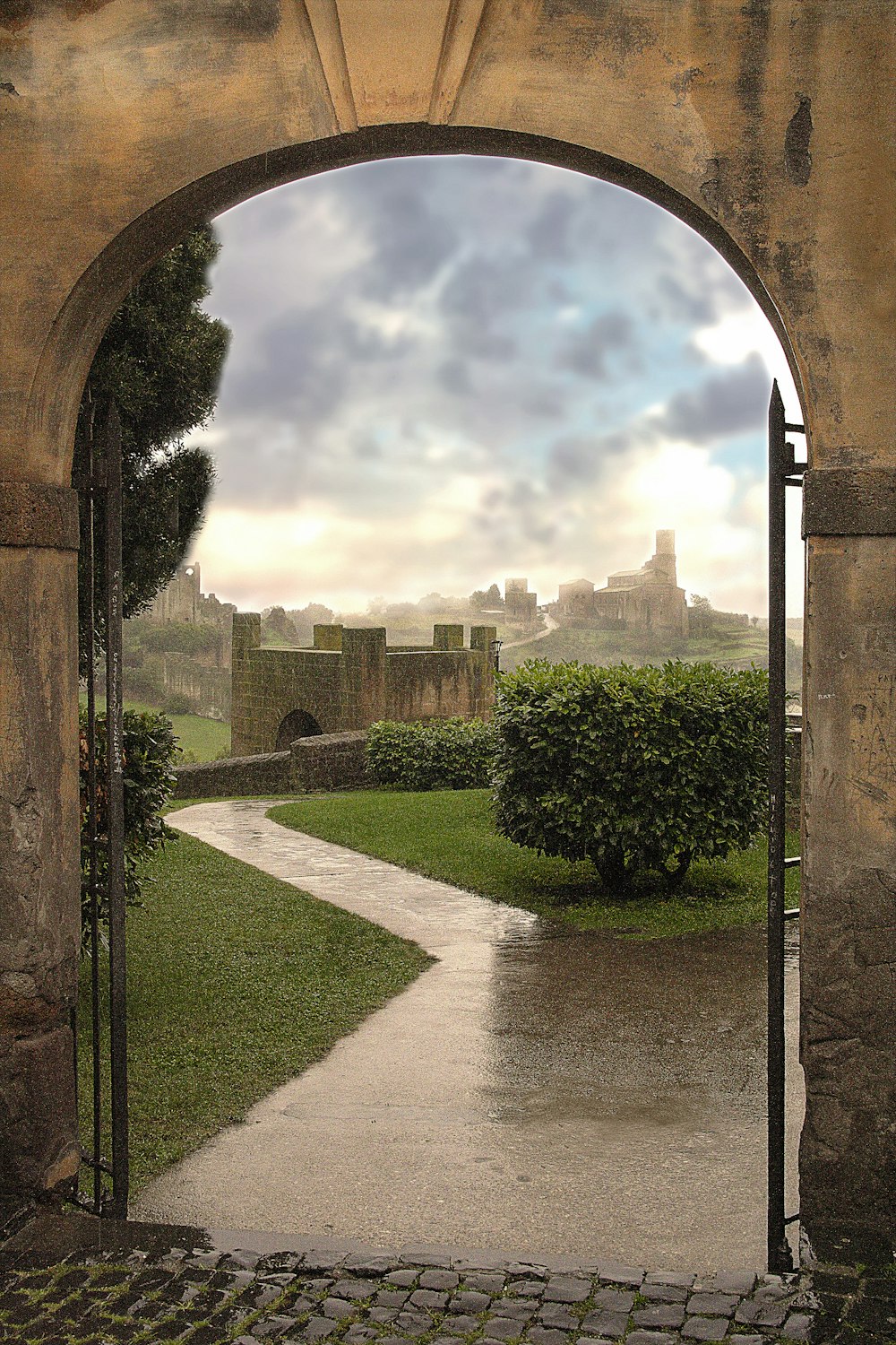 a view of a castle through an archway
