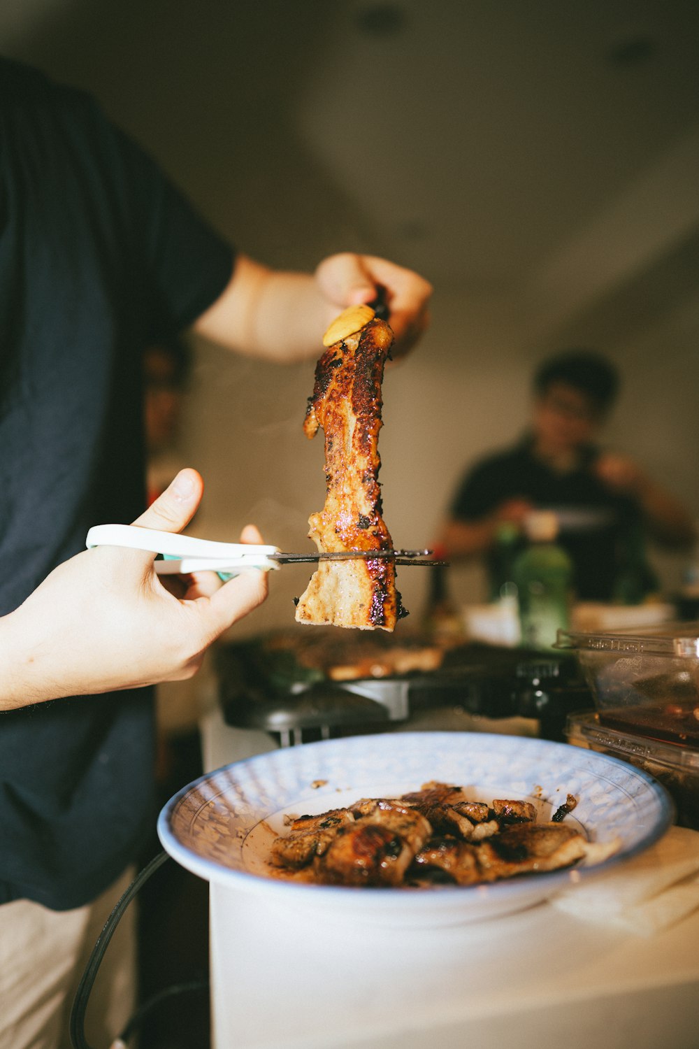 a person is holding a fork over a plate of food