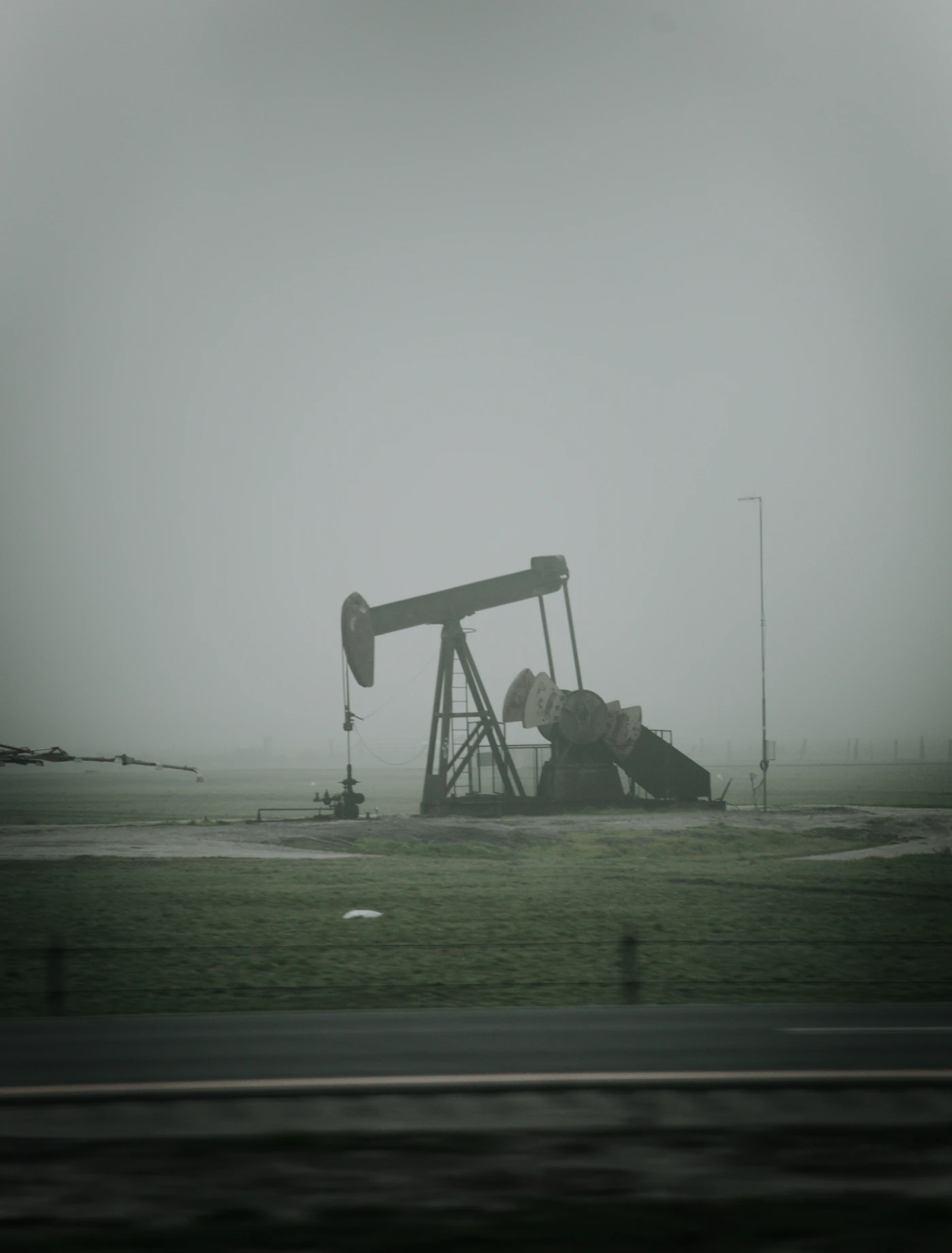 Oilfield equipment at sunset