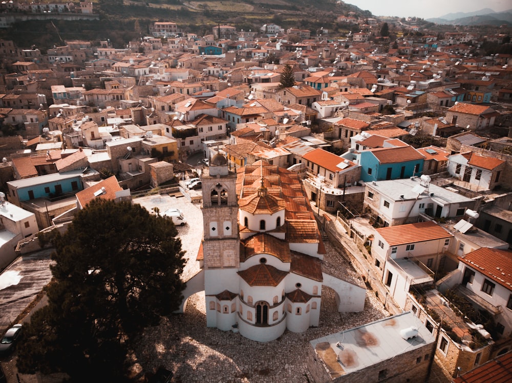 an aerial view of a city with many buildings