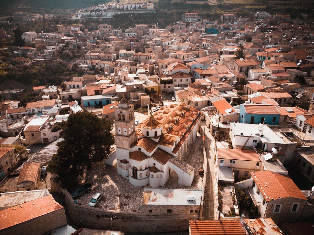 an aerial view of a city with many buildings