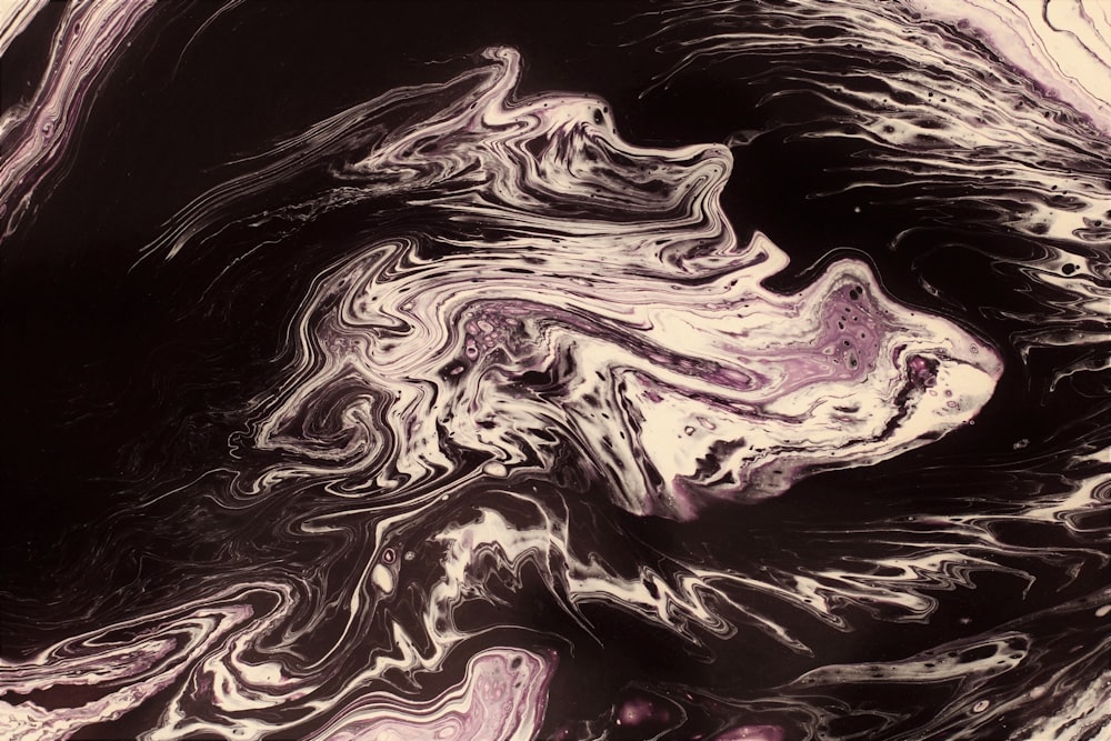 a close up of a black and white swirl