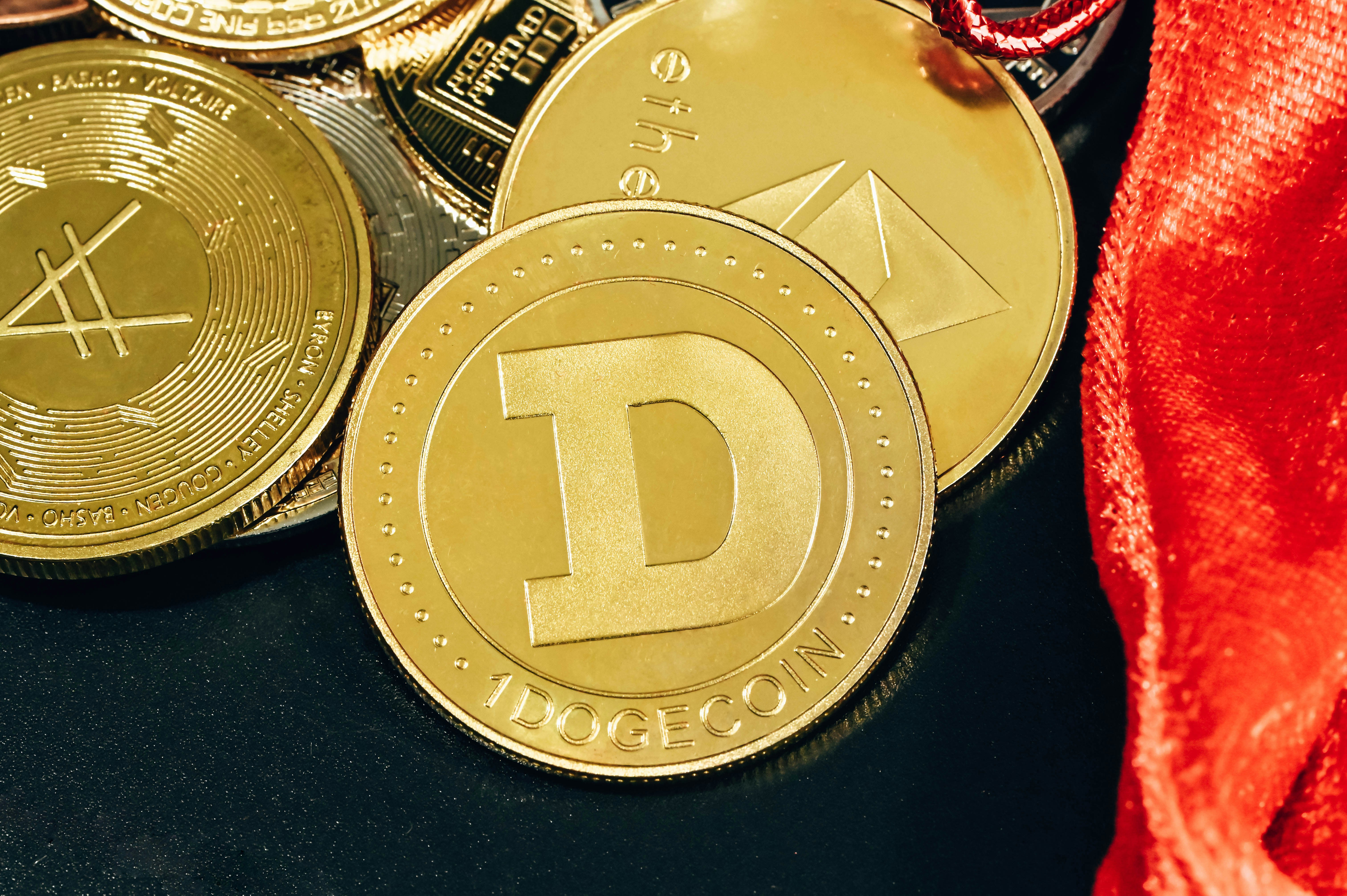 A variety of cryptocurrency coins placed on a black background