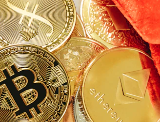 a pile of bitcoins sitting on top of a table