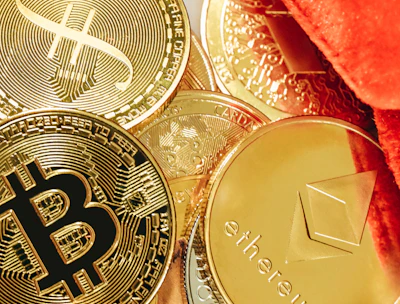 a pile of bitcoins sitting on top of a table