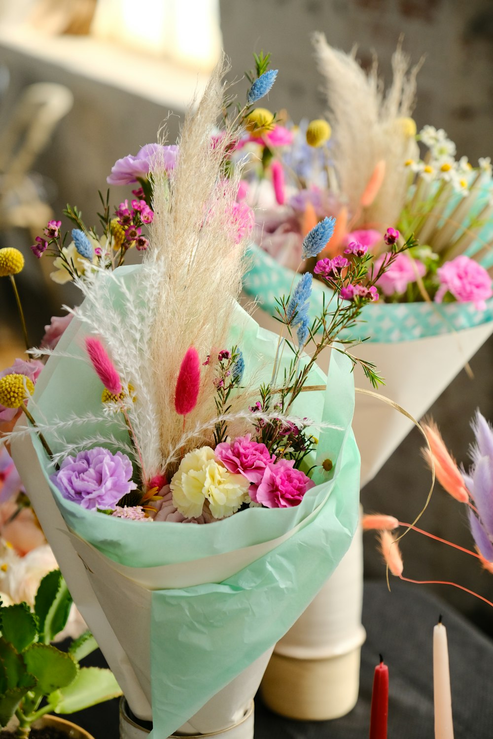 a bunch of flowers that are sitting on a table