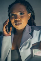 a woman is talking on a cell phone