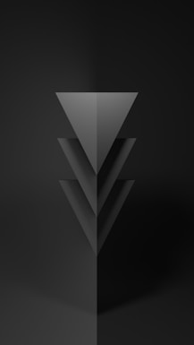 a black and white photo of a triangle