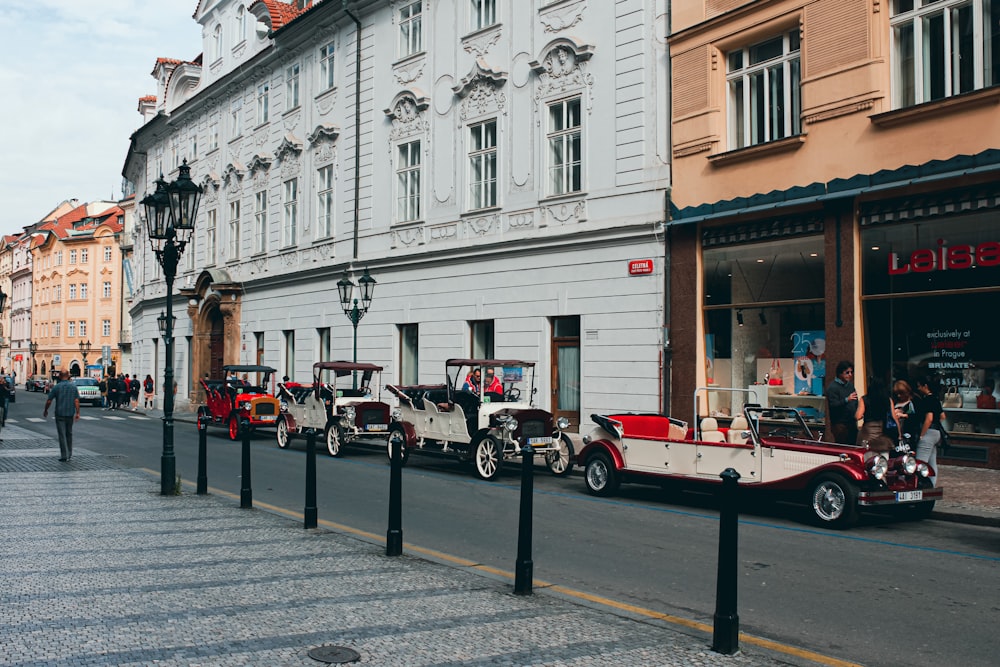 a row of cars parked on the side of a street