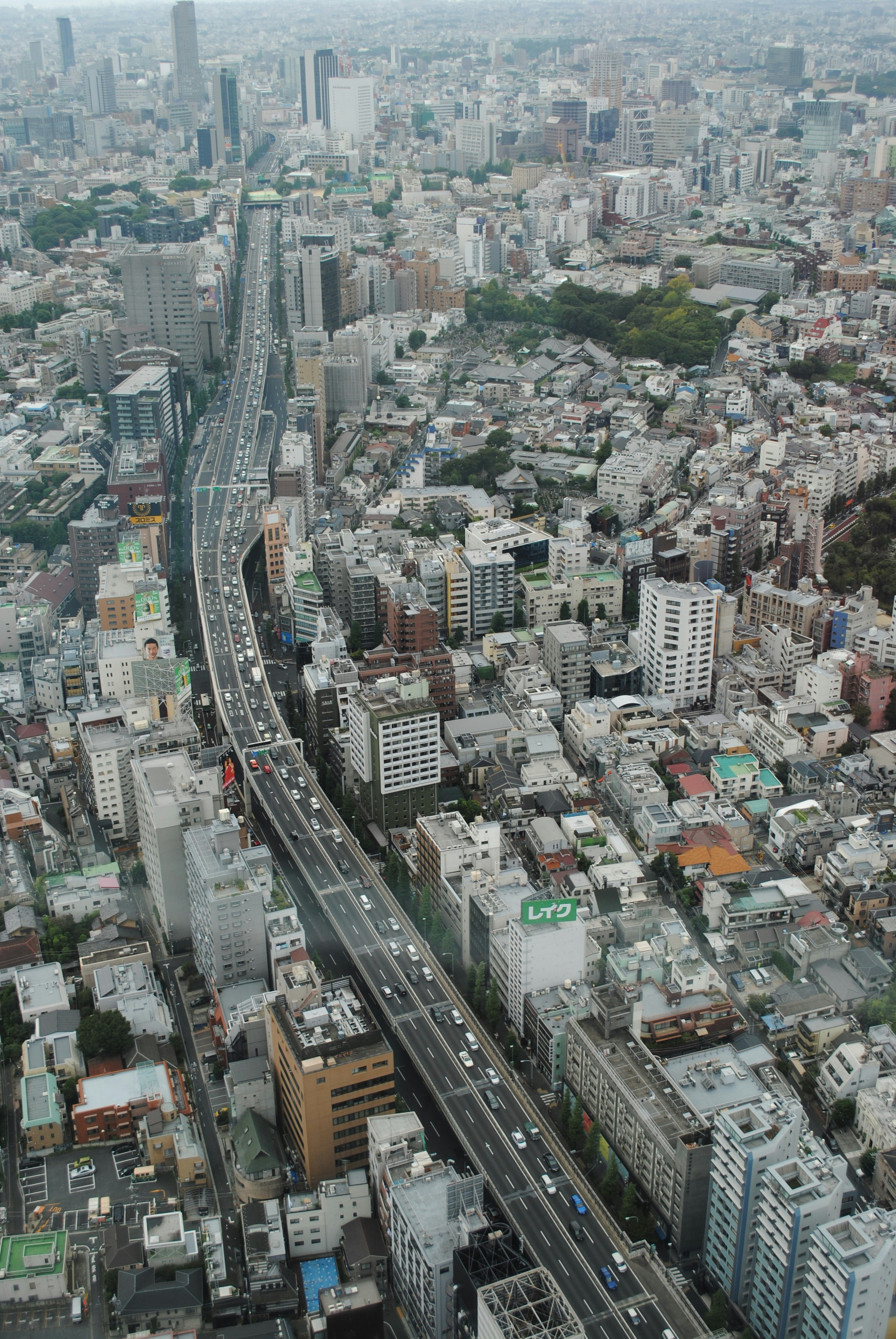 an aerial view of a city with lots of tall buildings