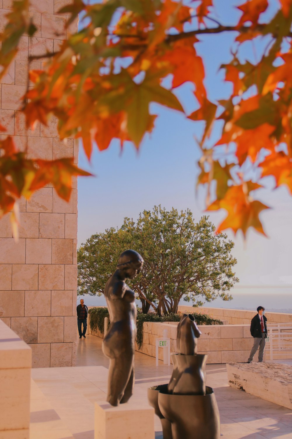 a couple of statues sitting next to each other