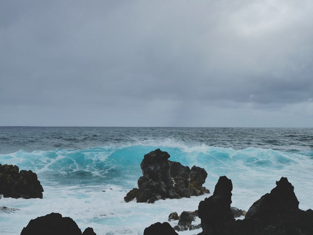 a large body of water surrounded by rocks