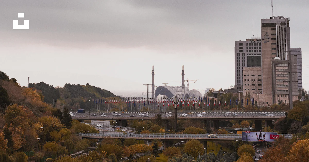 Tehran Rivers A view of a city with a bridge over a river photo – Free Tehran Image ...