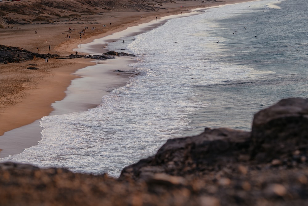 a view of a beach from a cliff