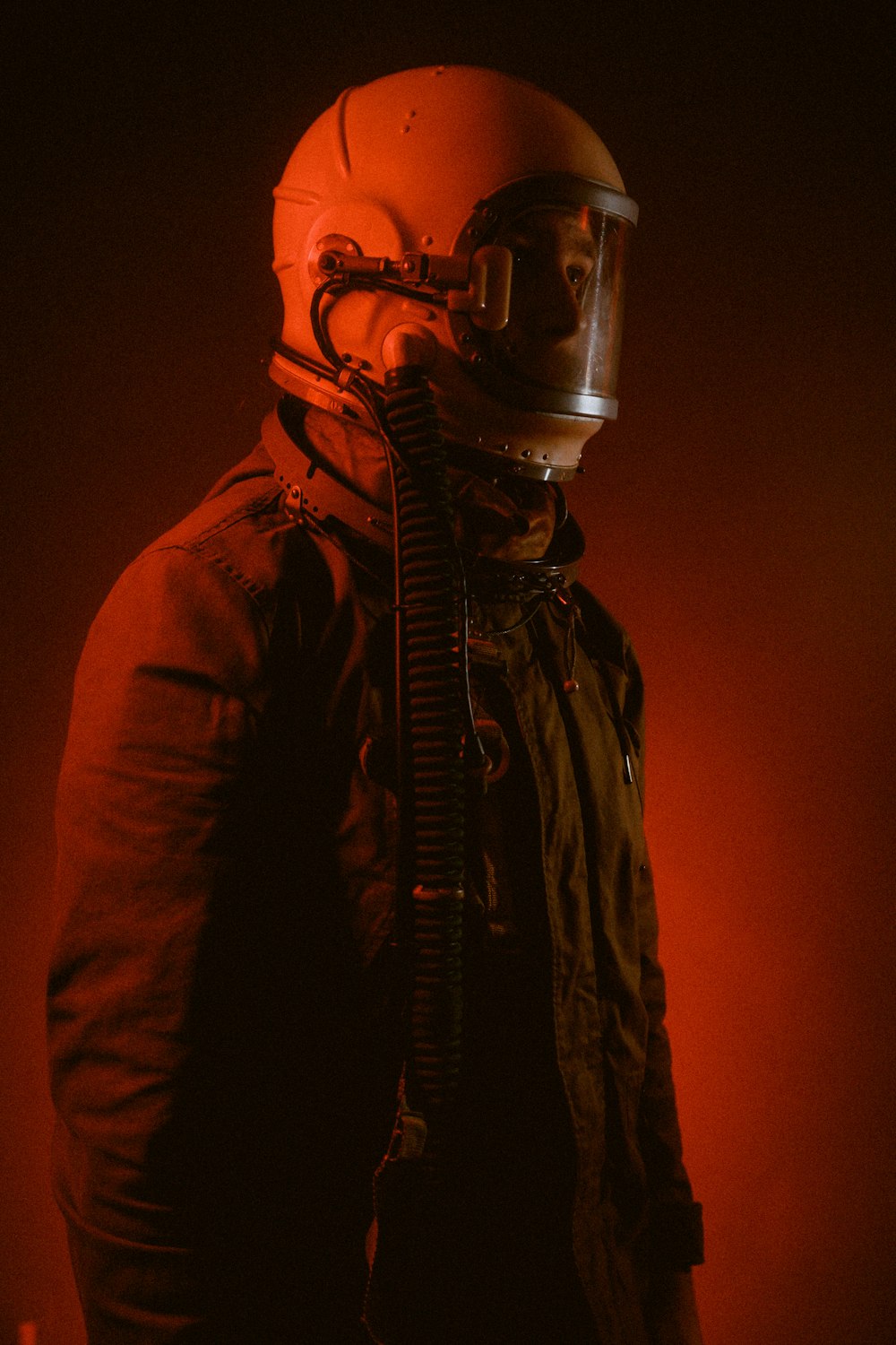a man wearing a helmet and a gas mask