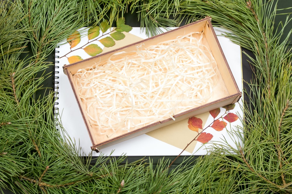 a box of shredded cheese sitting on top of a table